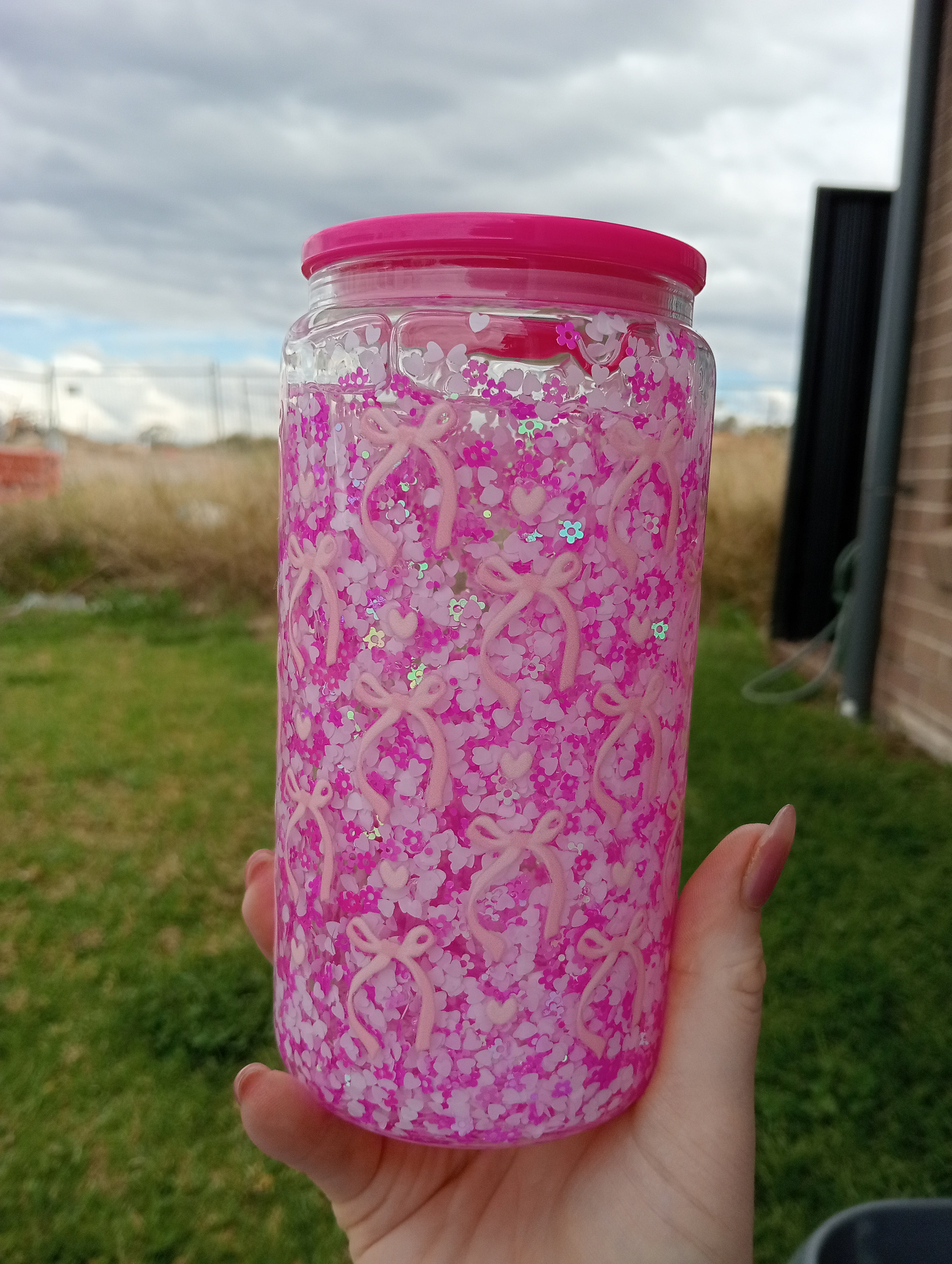 Pink bow glitter tumbler