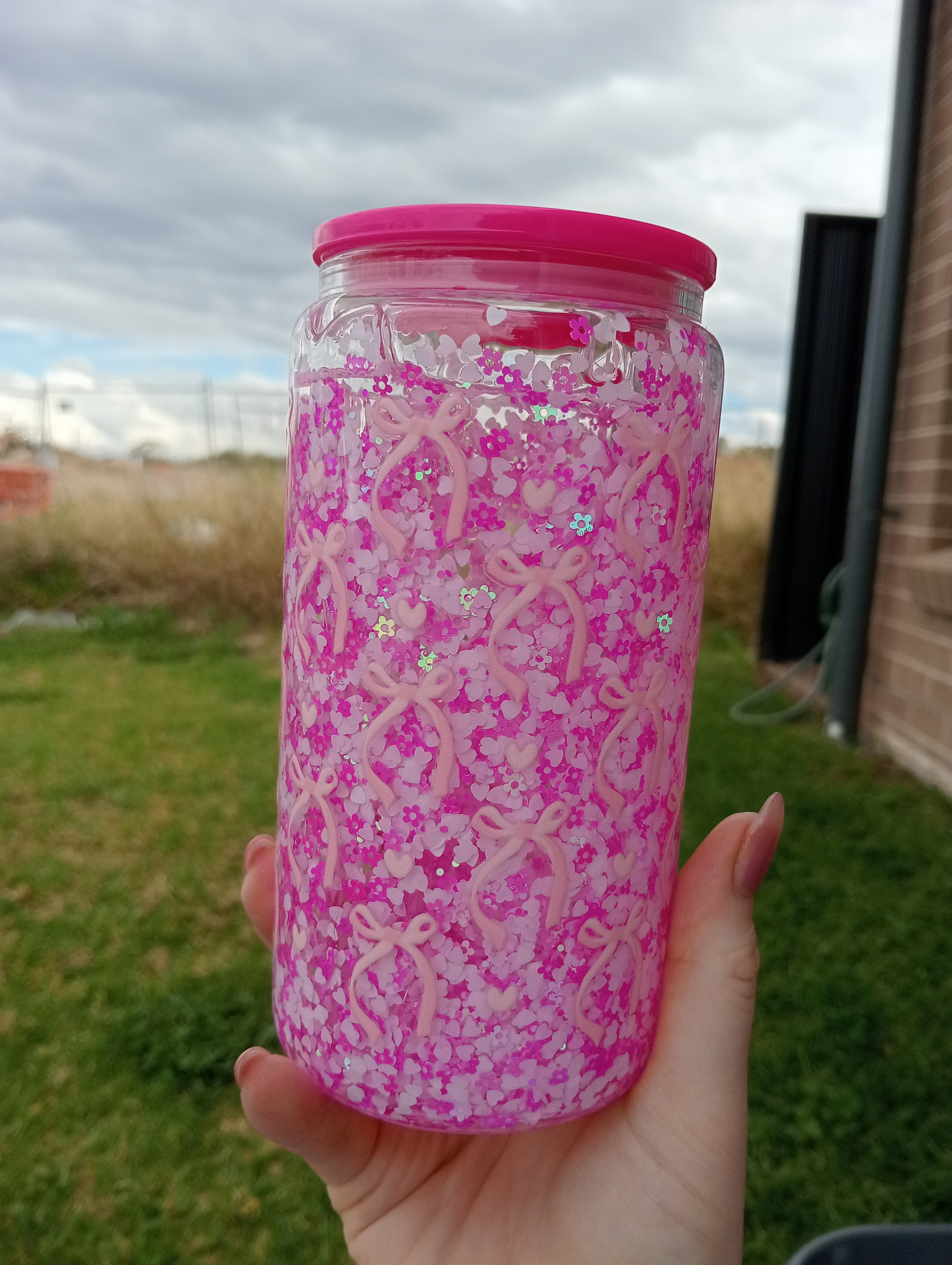 Pink bow glitter tumbler